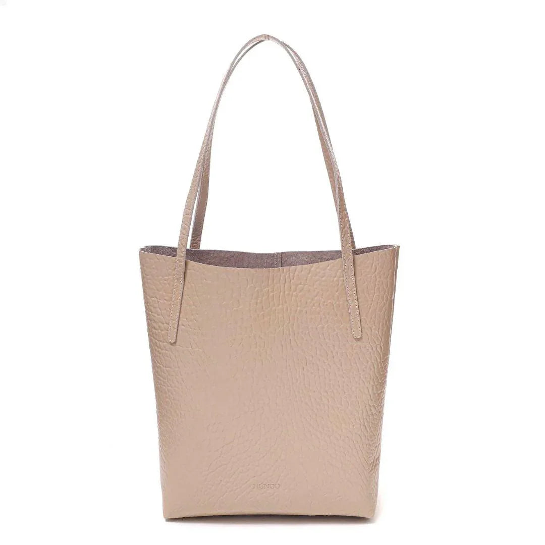 Voorkant Nunoo small fleur new zealand latte #kleur_latte