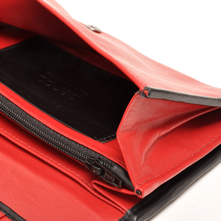 Details van het leer #kleur_rood-zwart