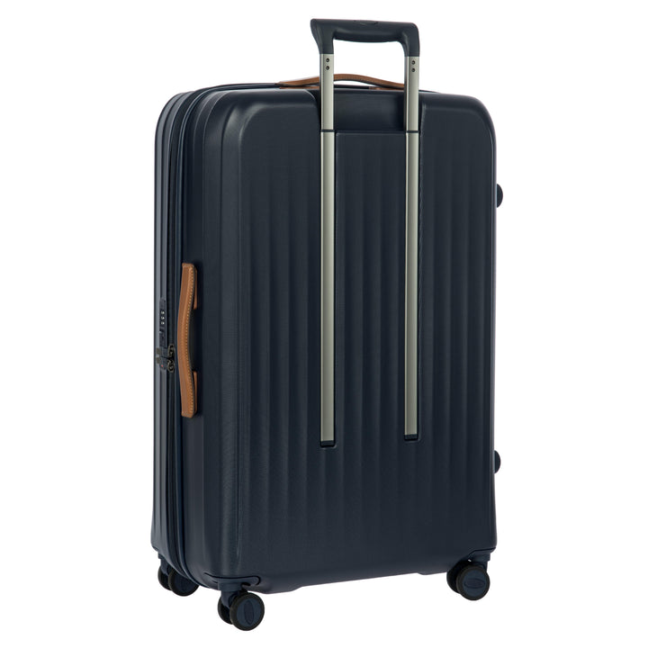 Achterkant van de Bric's Taormina grote koffer in navy #kleur_navy