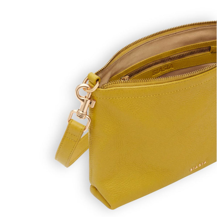 Binnenkant van de BIASIA slimme crossover tas in het geel #kleur_geel