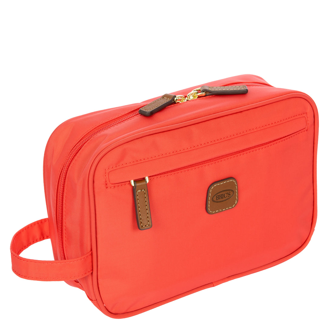 Voorzijde  van de Bric's toilettas in poppy #kleur_poppy