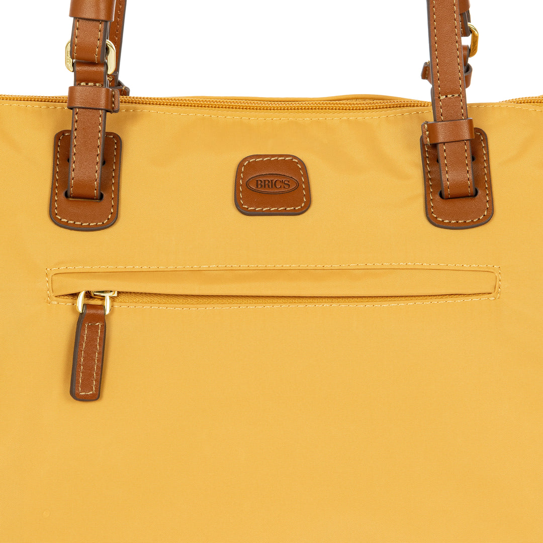 Details van het materiaal van de Bric's grote shopper in honey #kleur_honey