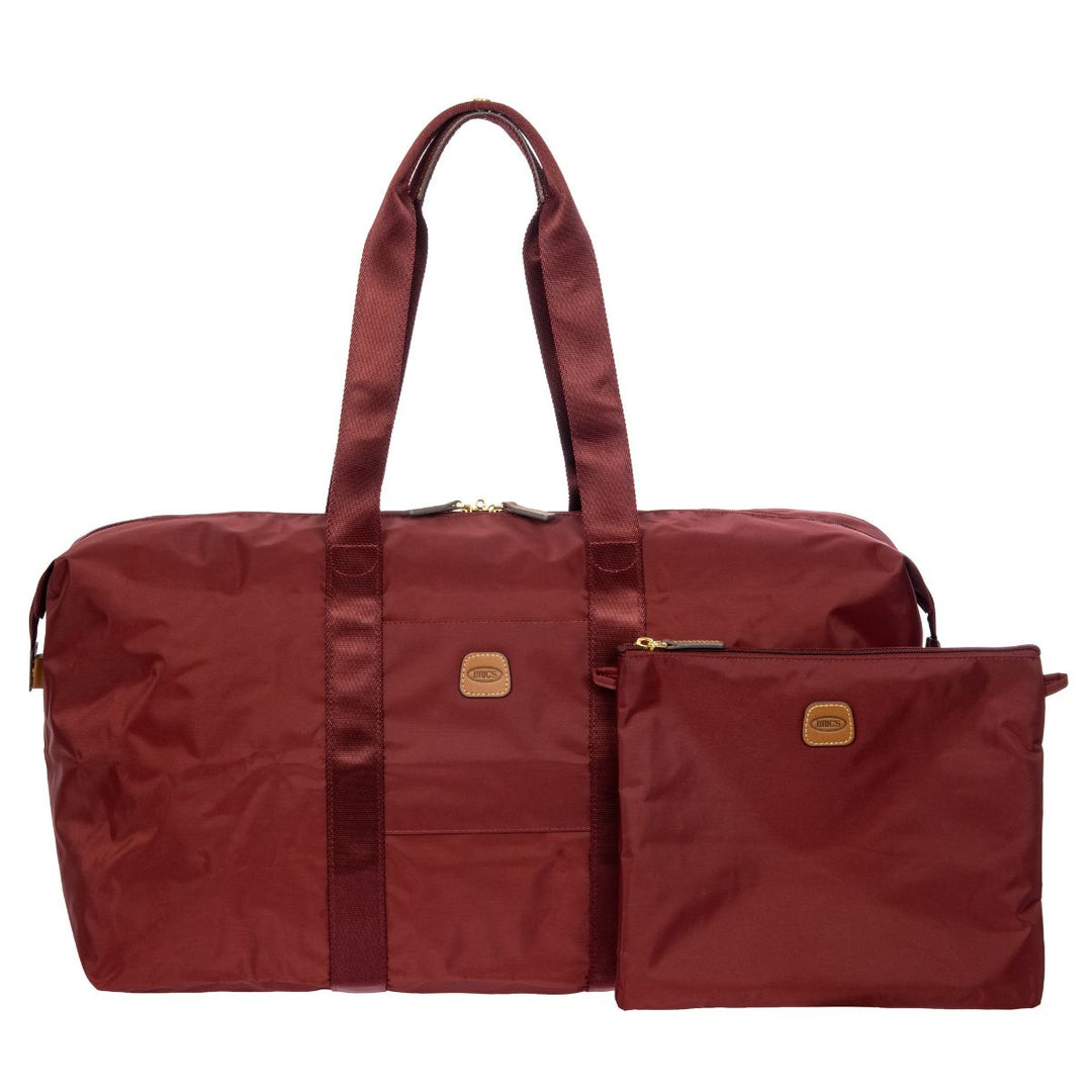 Voorkant met opvouwbare hoes van de Bric's 202 weekendtas uit de X-collection in Bordeaux #kleur_bordeaux