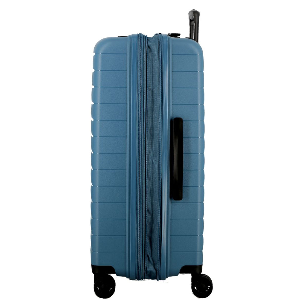 Zijkant met expandable in gebruik van de Jump Striper 77 expandable koffer blauw #kleur_blauw