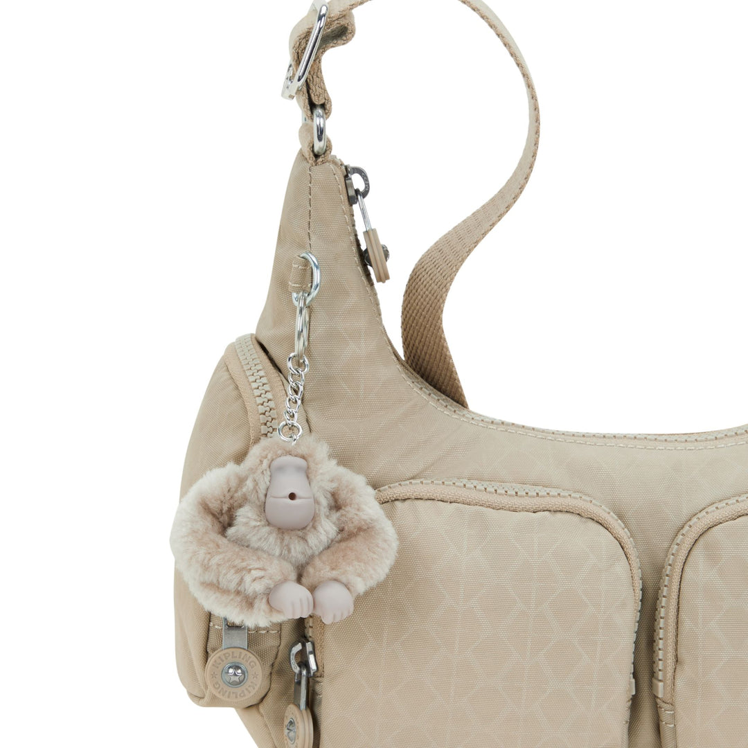 Details van de app van de Kipling Rikka - s- Beige-Embossed #kleur_beige-embossed