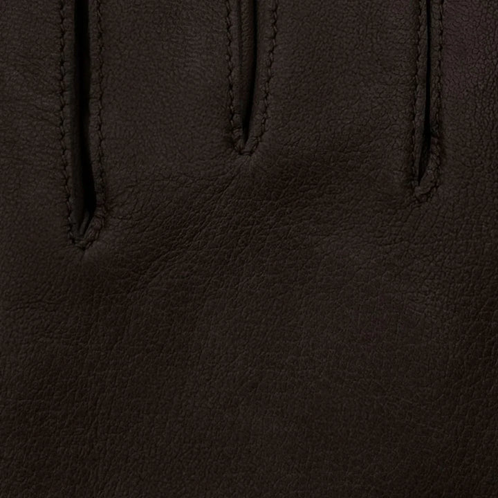 Details van het leer #kleur_donkerbruin