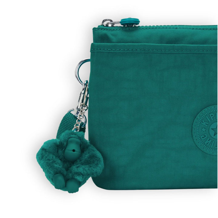 Details van het materiaal en het Kipling aapje #kleur_outspoken-green