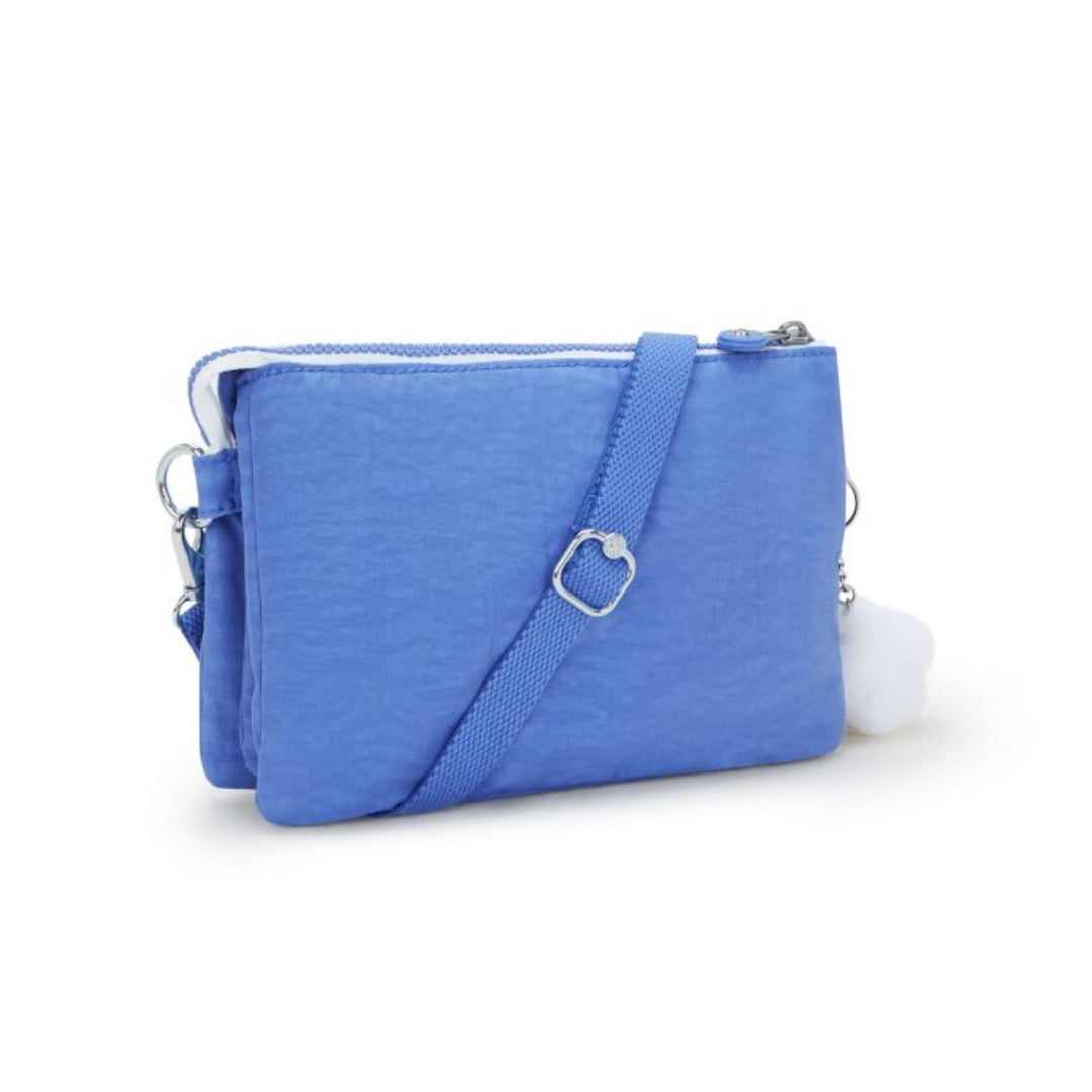 Achterkant van de Kipling RIRI crossbody tas in cocktail blue #kleur_cocktail-blue