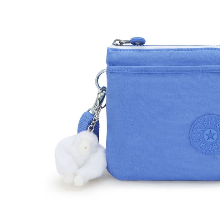 Details van het Kipling aapje #kleur_cocktail-blue