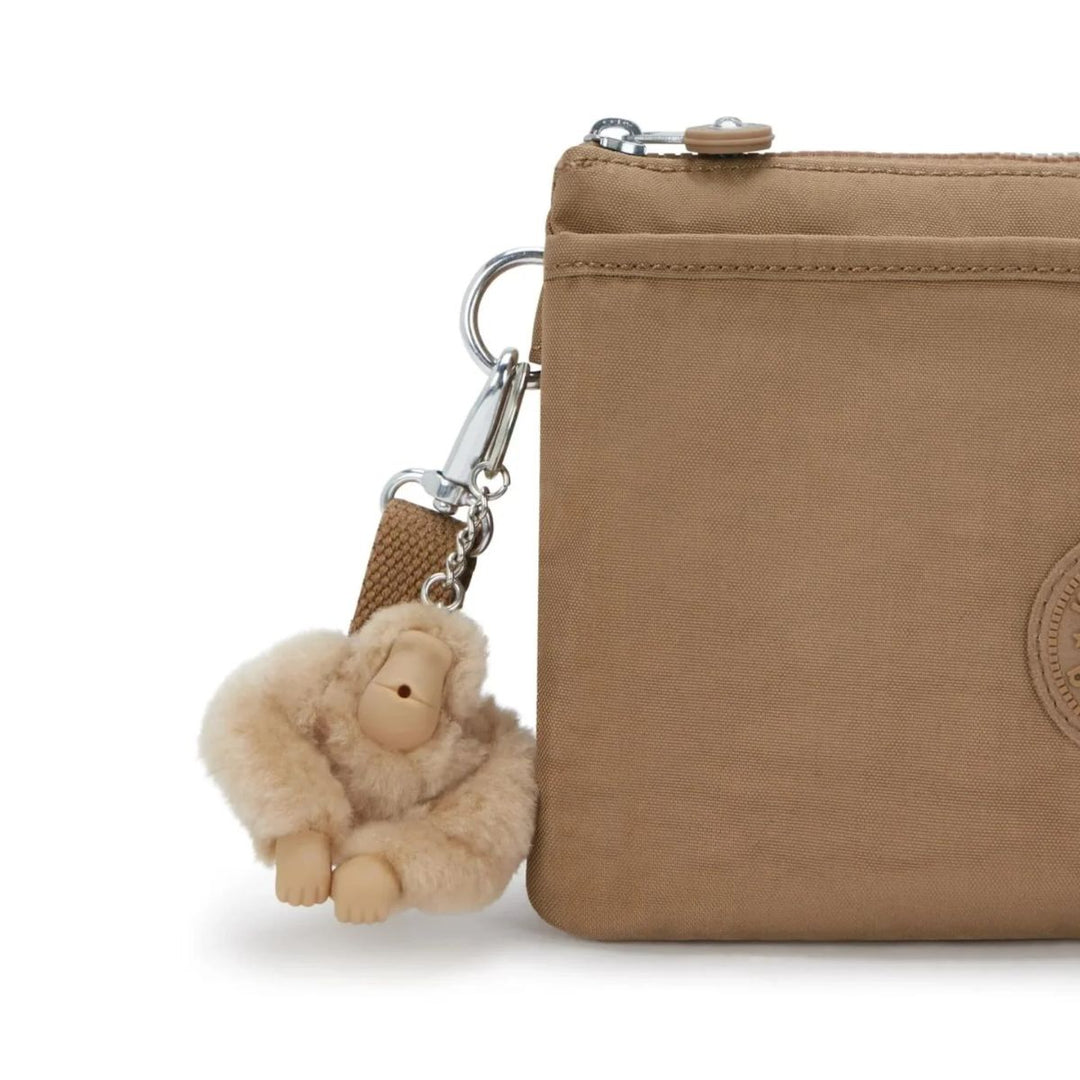Details van het kipling aapje #kleur_early-tan