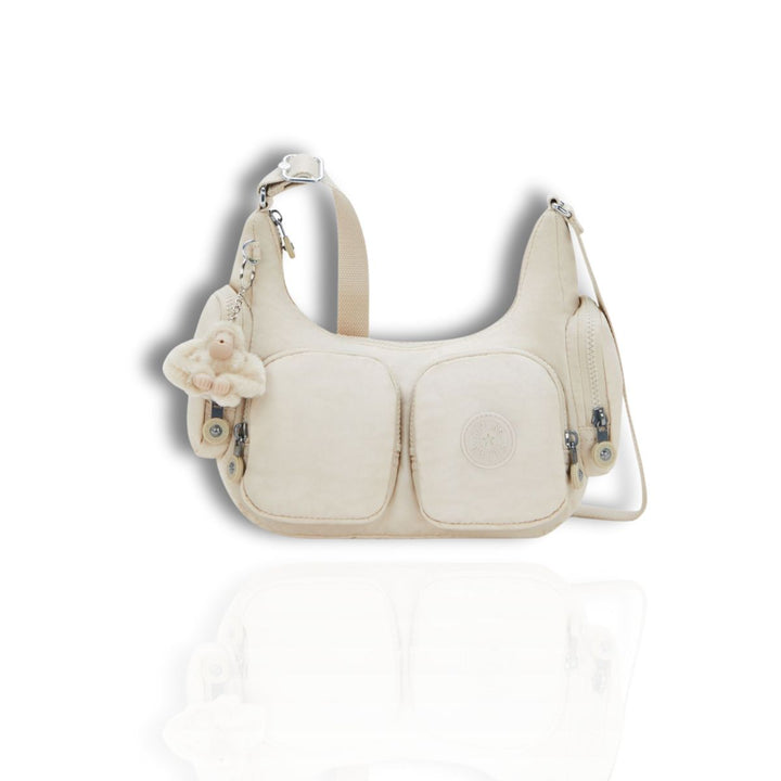 Voorkant van de Kipling Rikka - s- Hideaway-biege #kleur_hideaway-beige