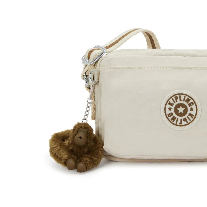 Details van het kipling aapje #kleur_sand