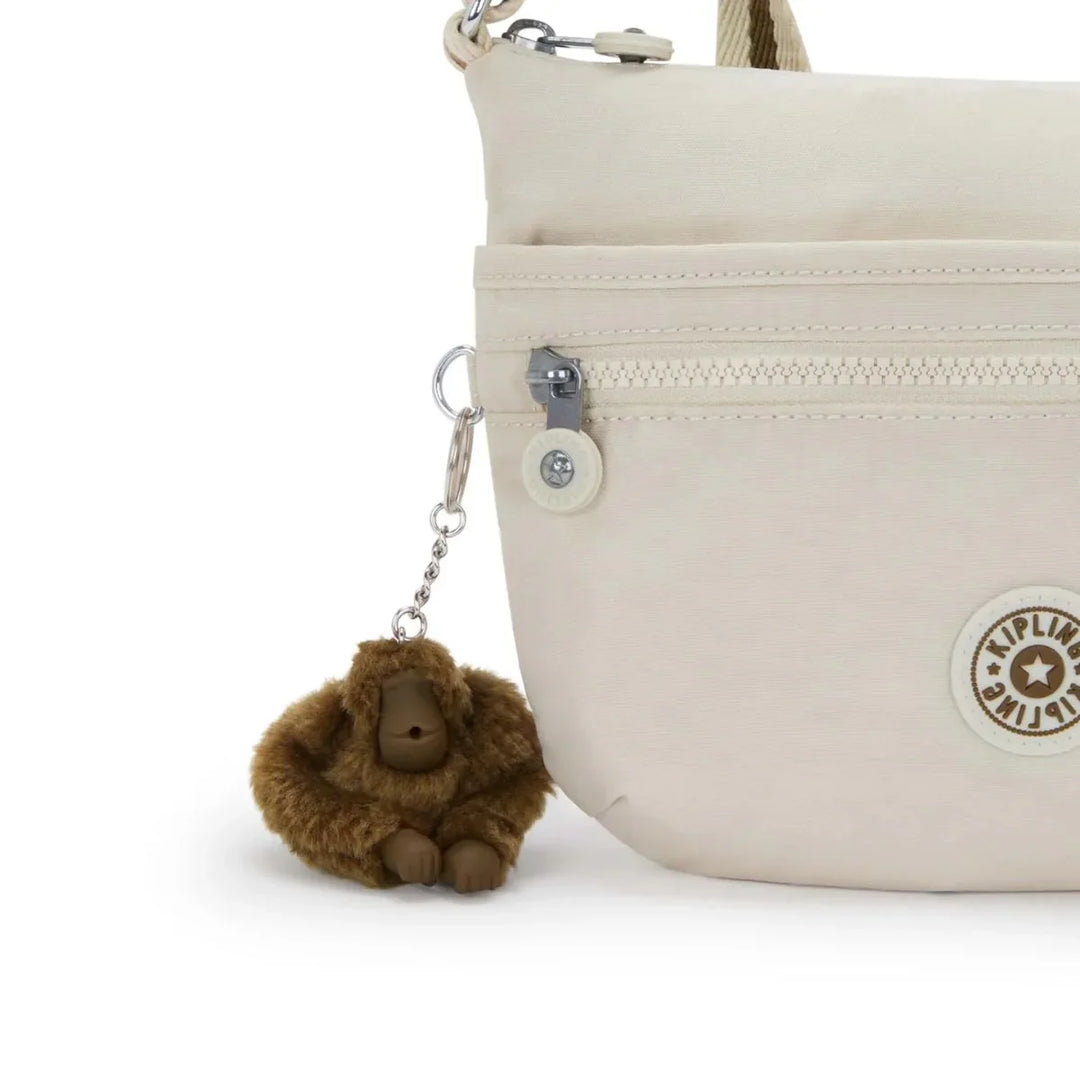 Details van het kipling aapje #kleur_sand
