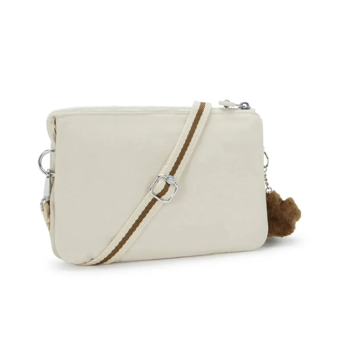 Achterkant van de Kipling RiRI soft sand #kleur_sand