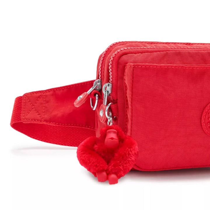 Details van het kipling aapje #kleur_red-rouge
