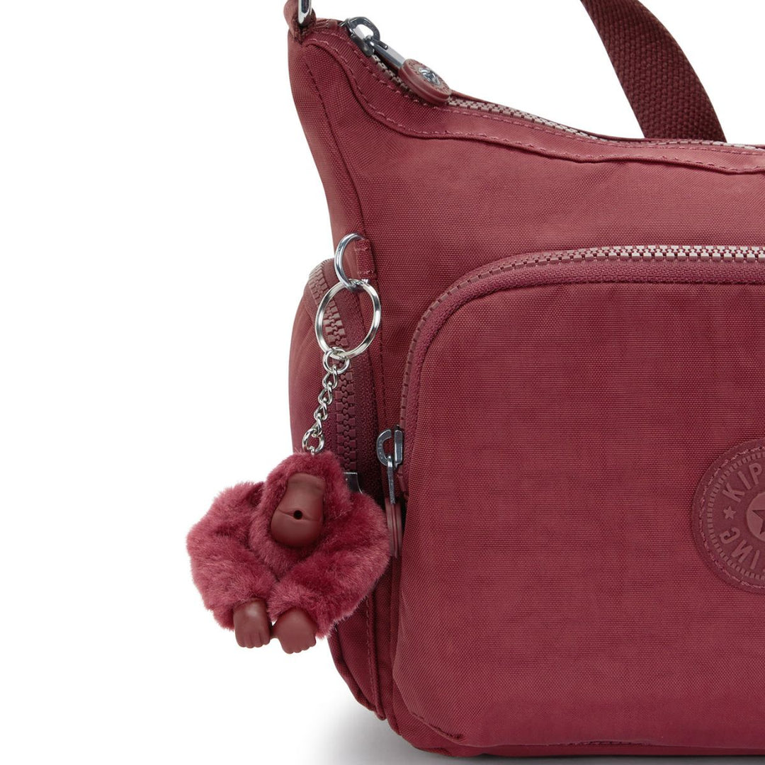 Details van het kipling aapje #kleur_lounge-wine
