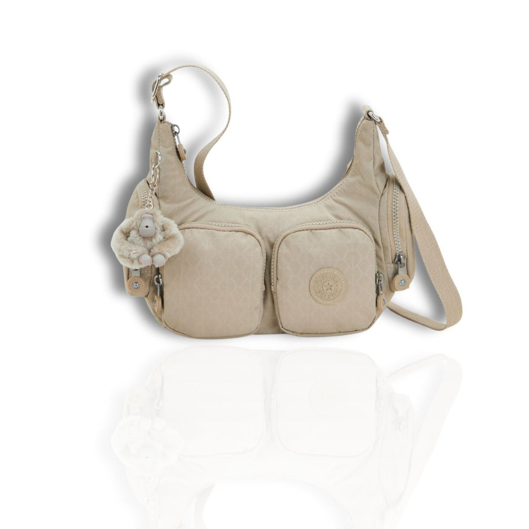 Voorkant van de Kipling Rikka - s- Beige-Embossed #kleur_beige-embossed