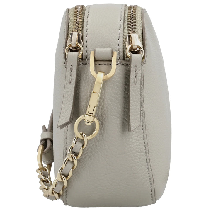 Zijkant van de Lou Lou Zoe crossover tas fog #kleur_fog
