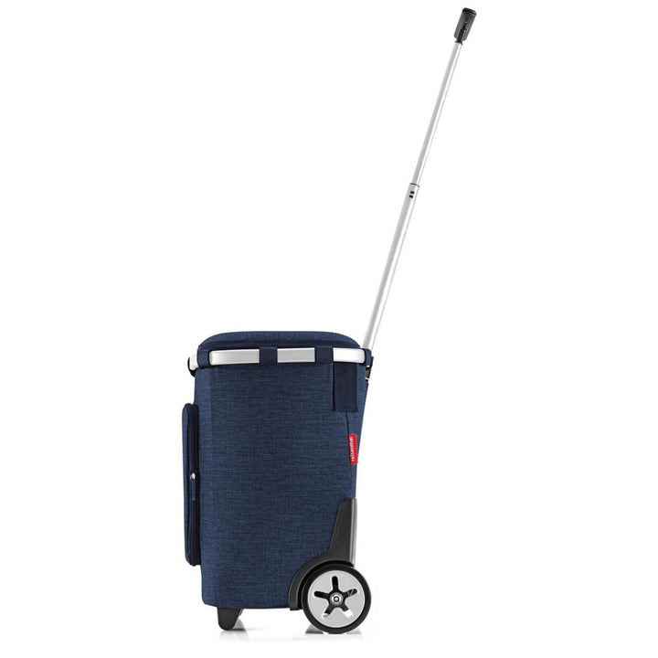 Zijkant van de Reisenthel Carrycuiser plus twist-navy #kleur_twist-navy 