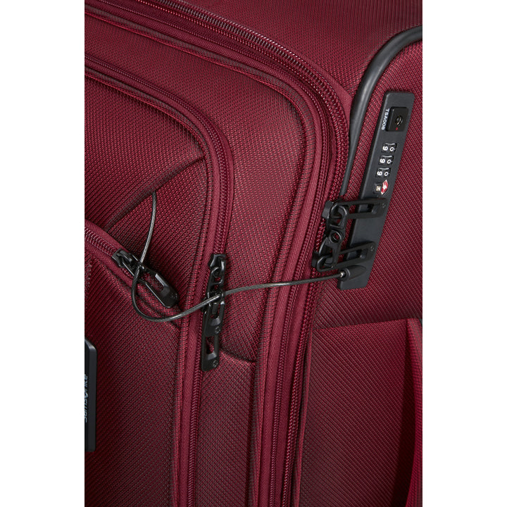 Zijkant met TSA slot van de Samsonite Respark middelmaat koffer 67 burgundy #kleur_burgundy