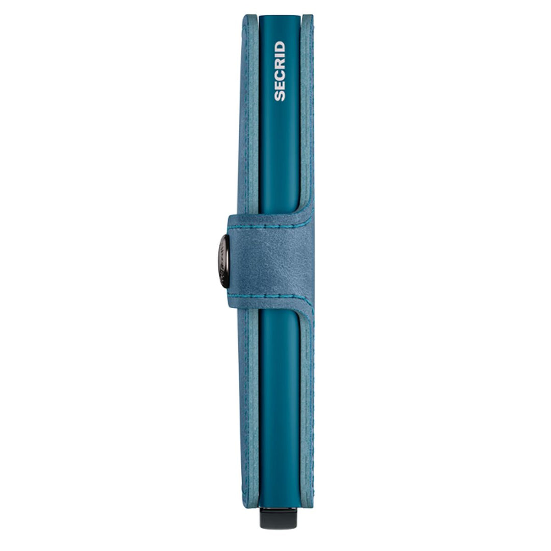Zijkant van de Secrid mini wallet teal #kleur_teal