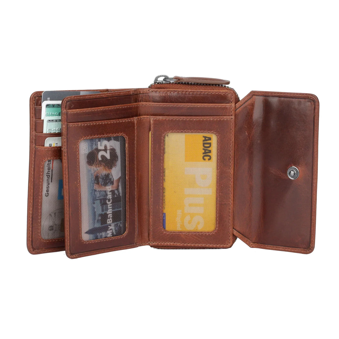 Binnenkant in gebruik van de Sparwell Nola dames portemonnee cognac #kleur_cognac
