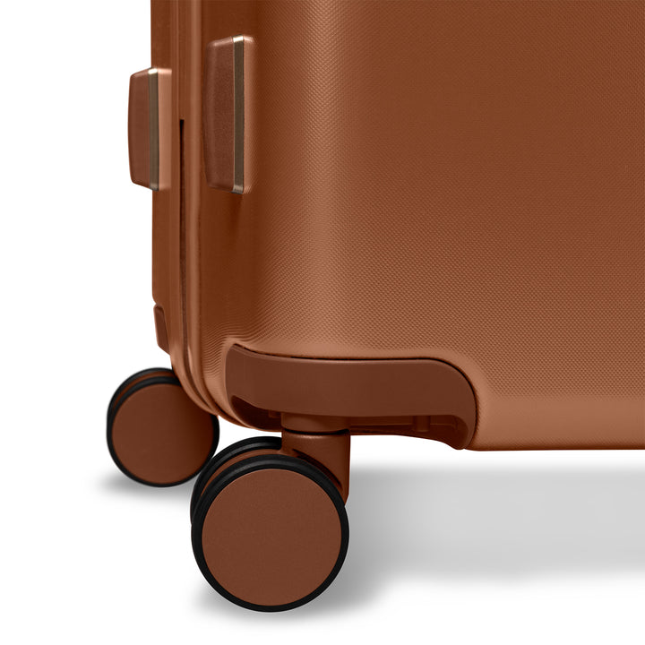 Wielen van de SUITSUIT Serenity middelmaat koffer 66 in caramel #kleur_caramel