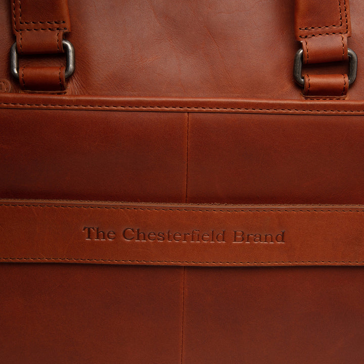 Details van de koffer sleeve #kleur_cognac