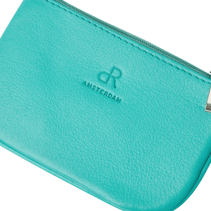 Details van het materiaal van de dR Amsterdam turquoise sleutel etui #kleur_turquoise